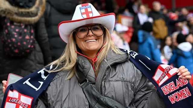 An England fan poses for a photo prior to the 2027 FIFA Women's World Cup Qualifier between England and Iceland at City Ground on March 07, 2026 in Nottingham.