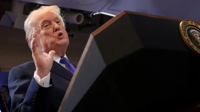 president trump at a lectern