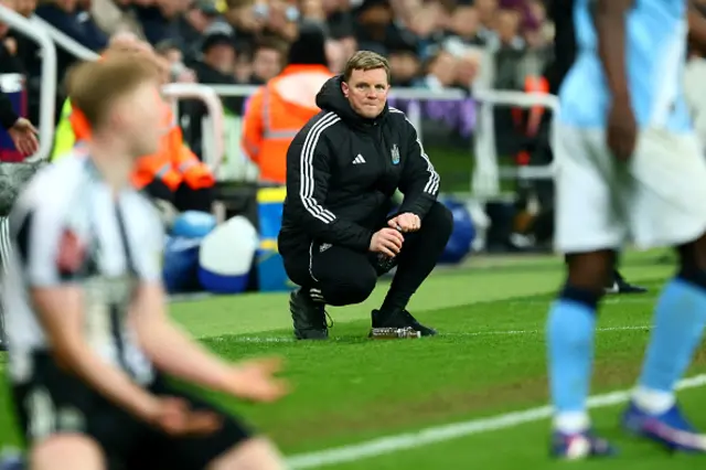 Newcastle United's English head coach Eddie Howe looks on