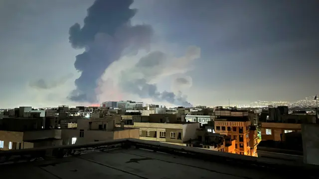 Description Smoke rises following an explosion, amid the U.S.-Israeli conflict with Iran, in Tehran, Iran, March 7, 2026