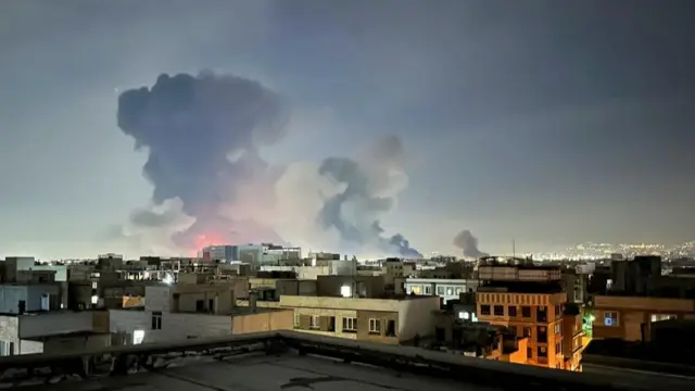 Smoke rises over the Iranian capital of Tehran