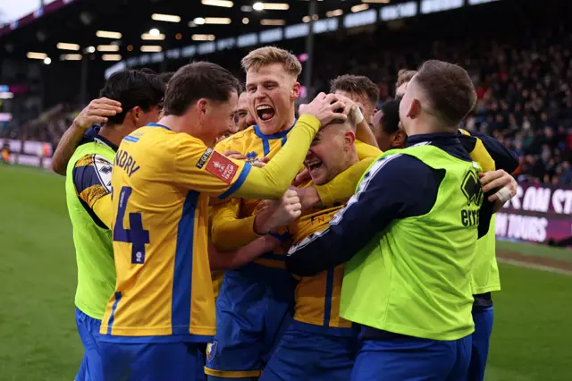 Mansfield Town celebrate win over Burnley in FA Cup fourth round