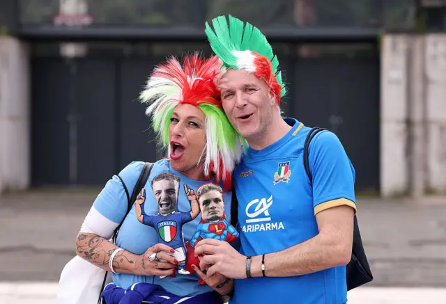 fans dressed in Italian fancy dress