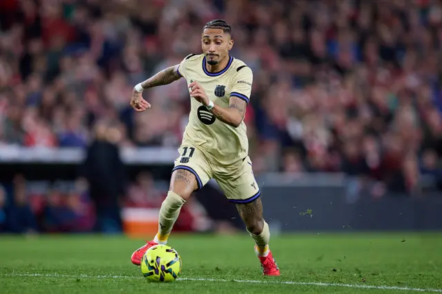 Raphael Dias 'Raphinha' of FC Barcelona carries the ball