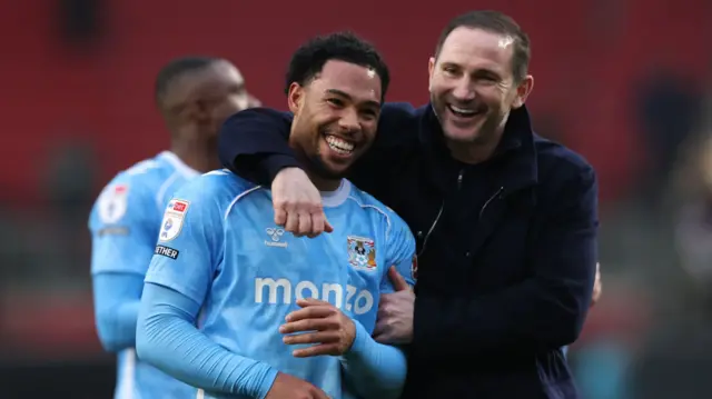 Frank Lampard, manager of Coventry City, celebrates with Milan van Ewijk following their 2-0 win at Bristol City