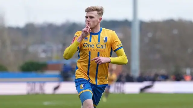 Evans celebrating