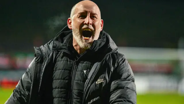 Larne manager Gary Haveron celebrates