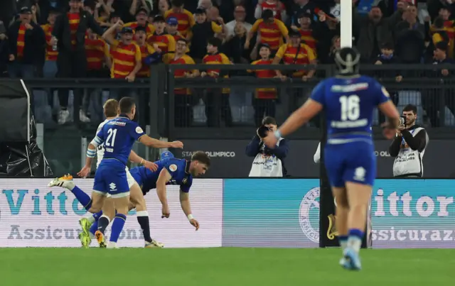 Italy's Leonardo Marin scores their second try