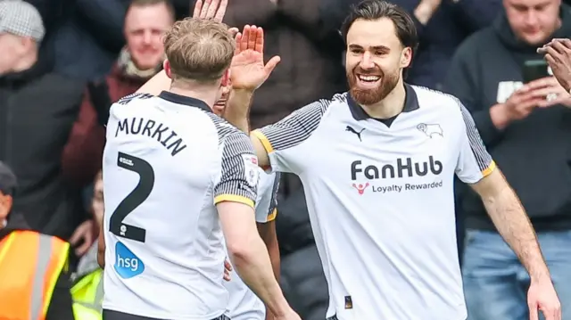 Derby celebrate scoring