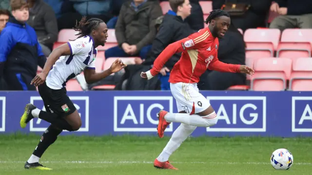 Action from Salford versus Barnet
