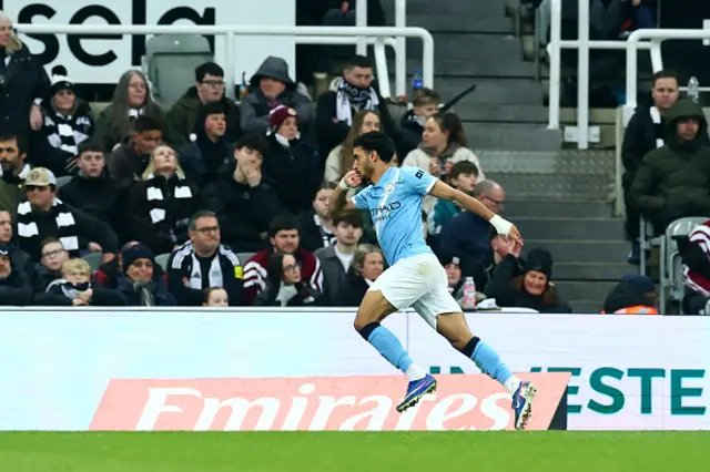 Omar Marmoush celebrates