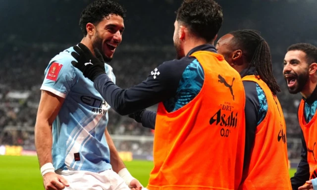 Manchester City's Omar Marmoush (left) celebrates