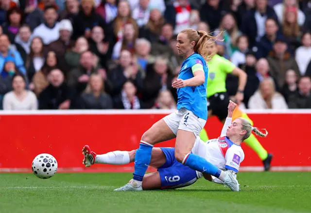 Alessia Russo of England shoot whilst under pressure from Glodis Viggosdottir of Iceland during the 2027 FIFA Women's World Cup Qualifier between England and Iceland at City Ground on March 07, 2026.