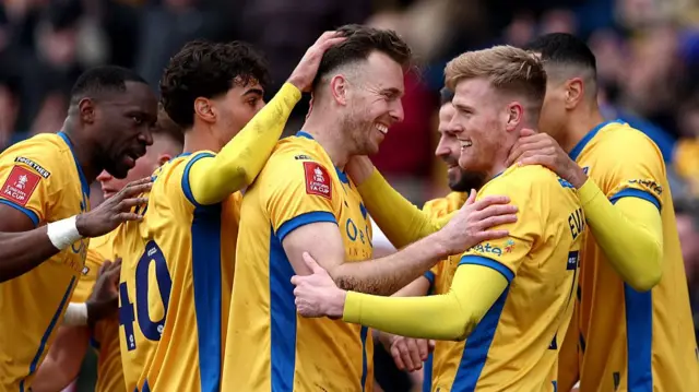 Evans celebrating with team-mates