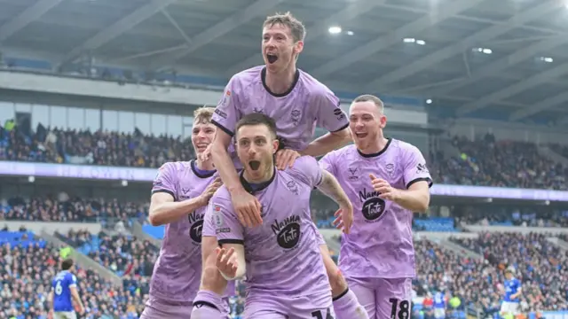 Lincoln celebrate their second goal