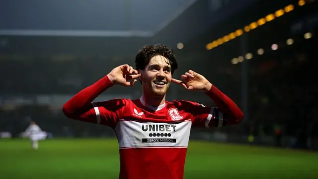 Middlesbrough goalscorer Hayden Hackney cups his ears in celebration