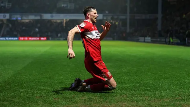 Alan Browne slides on his knees in celebration at Loftus Road