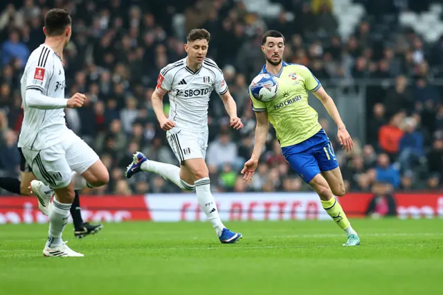 Finn Azaz chests the ball