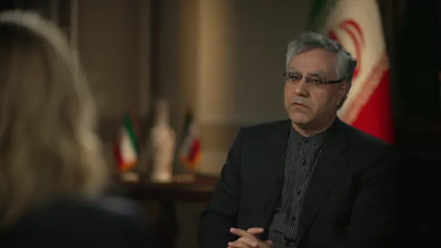 Iranian ambassador Seyed Ali Mousavi sits on a chair facing Laura Kuenssberg