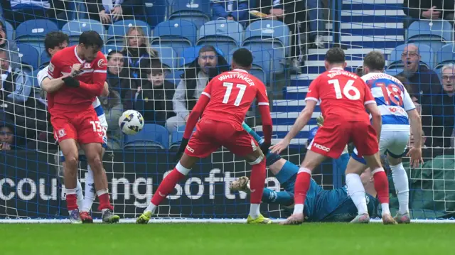 The ball strikes Boro forward David Strelec before crossing the line