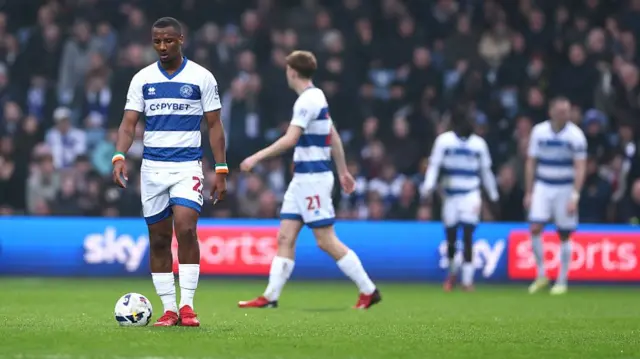 QPR players look to the pitch after conceding against Middlesbrough