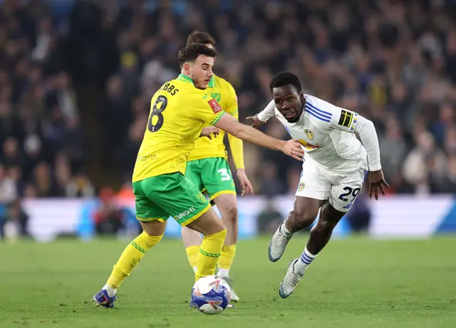 Wilfried Gnonto is challenged by Liam Gibbs