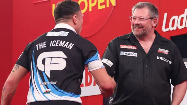 Gerwyn Price and James Wade shake hands