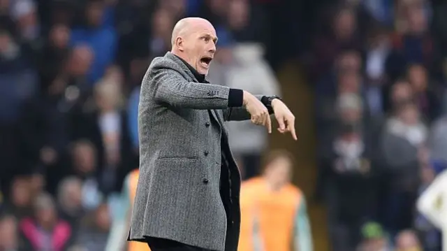 Clement gesturing