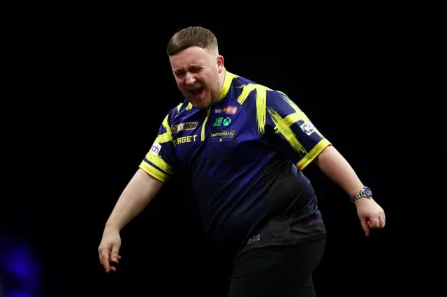 Luke Littler celebrating