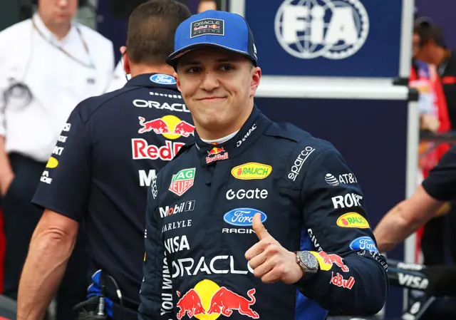 Isack Hadjar gives a thumbs up
