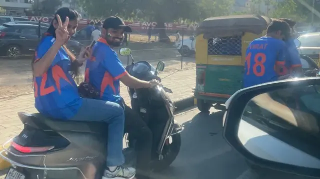 India fans on motorbike