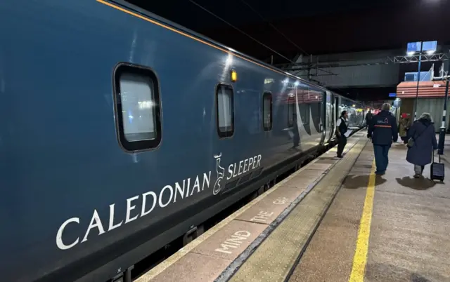 Caledonian Sleeper train arriving at Birmingham International station
