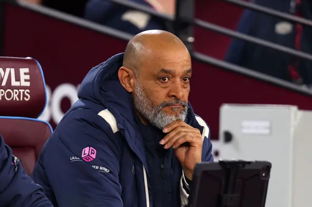 Nuno sits pensively on the bench