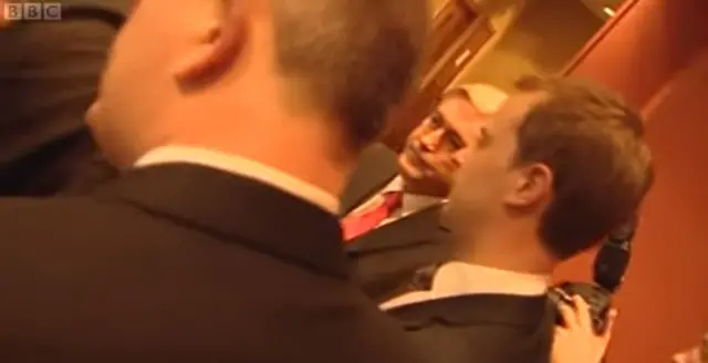 Then Scottish Labour Iain Gray and colleagues are confronted by protesters in a Subway