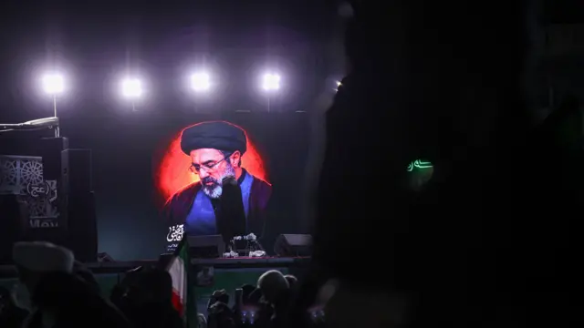 A picture of Iran's new supreme leader, Mojtaba Khamenei, is displayed on a screen in Tehran