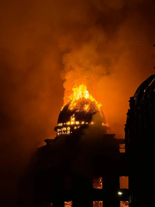 a picture of the building on fire