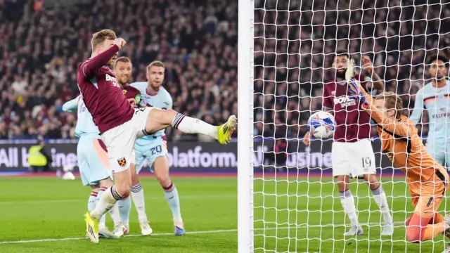 Bowen taps home the opener at the back post