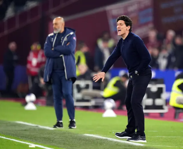 Both managers shout instructions on the sideline