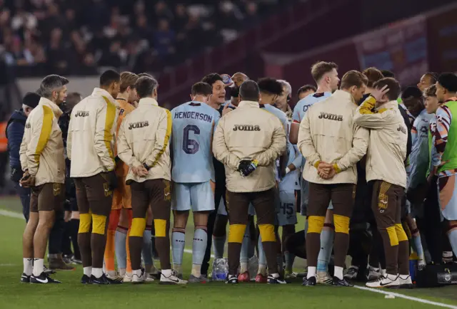 Andrews addresses his squad in the huddle