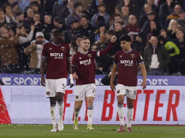 Bowen walks back to kick off after celebrating his goal