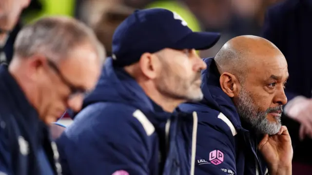 Nuno sits in his seat on the bench
