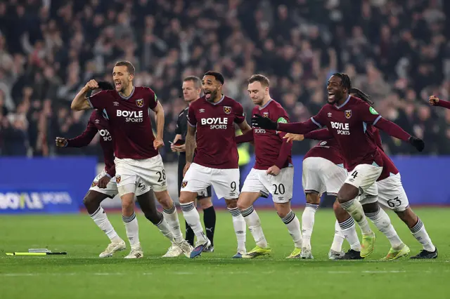 West Ham players run to celebrate as they win the shootout