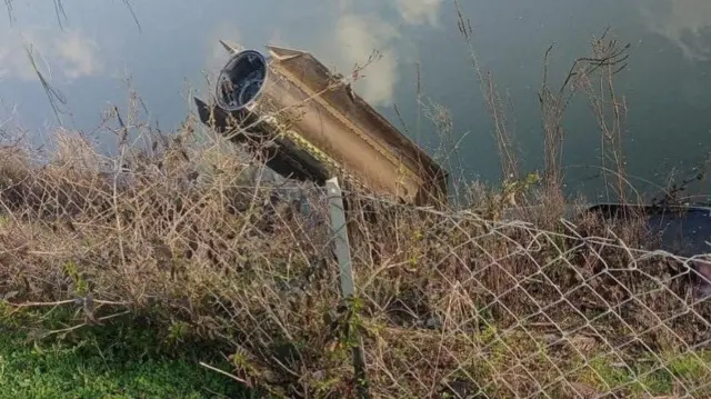 Debris of a NATO air defence system that intercepted a missile launched from Iran is seen in Dortyol, in southern Hatay province, Turkey, March 4, 2026 in this screengrab from video. Ihlas News Agency (IHA) via REUTE