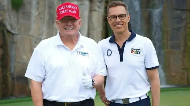 Trump and Stubbs are pictured playing golf together
