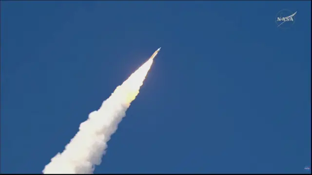 rocket flying through sky