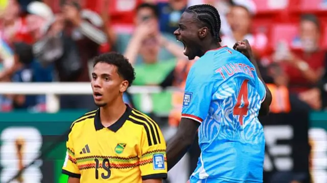 Axel Tuanzebe celebrates scoring for DR Congo