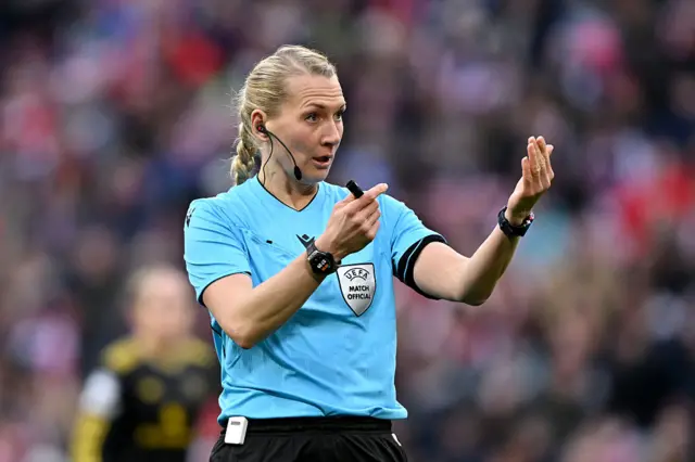 Ref waves the ball away