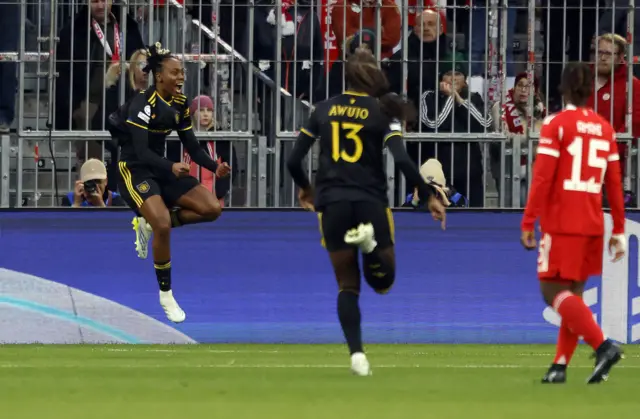 Malard celebrates her goal