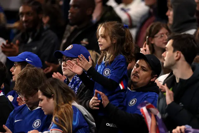 Chelsea fans cheer from the stands
