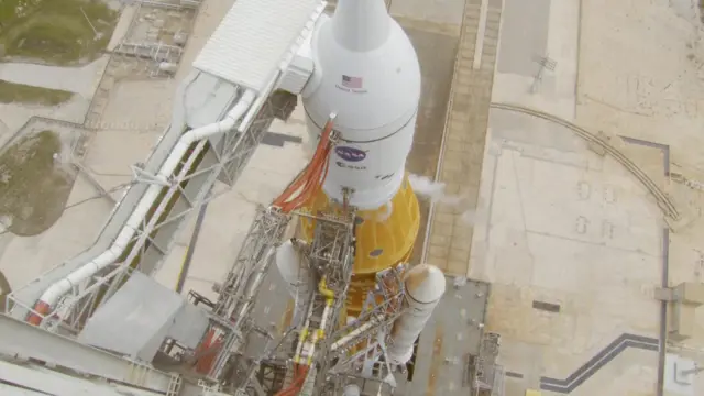 The rocket as seen from above - it is huge, with the ground appearing far away from the top